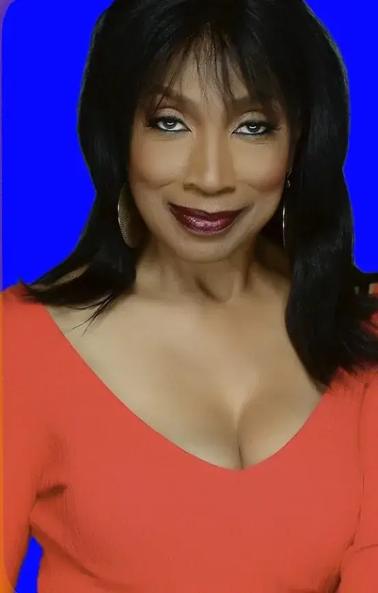 Press photo: Orange, blue backdrop